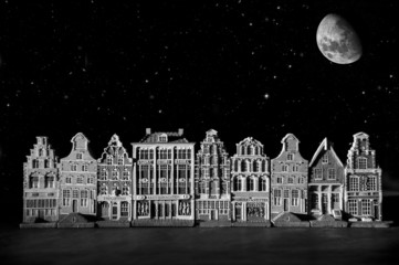 Canal houses against starry sky - 70199556