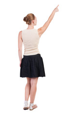 Back view of  pointing woman.