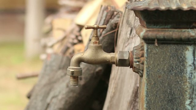 Old Faucet Dripping Water