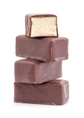 Delicious chocolates on a white background.