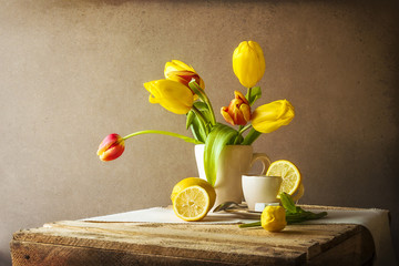 Still life bouquet yellow tulips cup of tea © Yotka