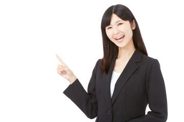 指差して笑うビジネスウーマン