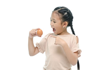 Asian girl smiiing and holding egg