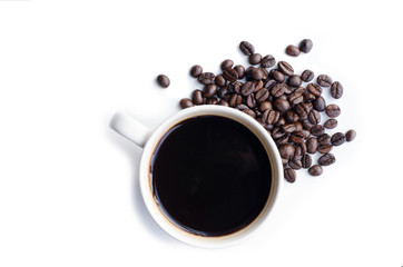 white cup of hot coffee with coffee beans top view