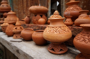 Fototapeta na wymiar Handcraft Thai traditional clay pottery in Koh Kred, Thailand