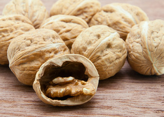 walnuts on the wooden background