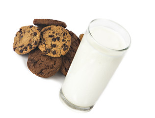 Milk glass  and cookies on white background