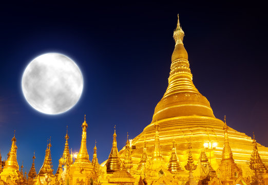 Shwedagon Pagoda and big moon in Yangon, Myanmar (Burma)