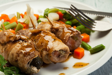 Pork rolls and vegetables