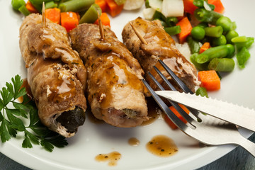 Pork rolls and vegetables