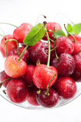 Fresh wet cherry in a glass,