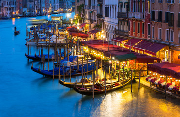 Night view of Grand Canal with gondolas in Venice. Italy - obrazy, fototapety, plakaty