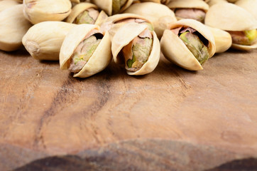 Pistachio nut on wooden background