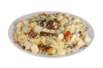 vegetable stew with sweet peppers and rice on a plate, isolated