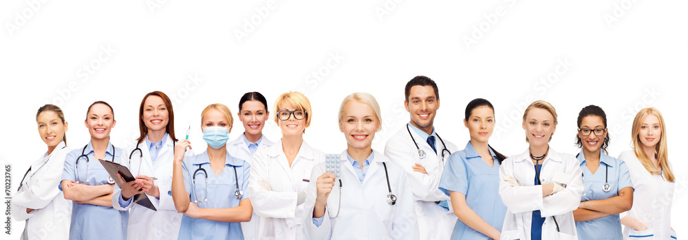 Wall mural smiling doctors and nurses with stethoscope