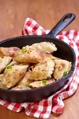 Dumplings fried with onion