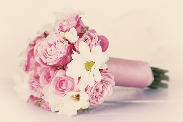 Beautiful wedding bouquet on light background