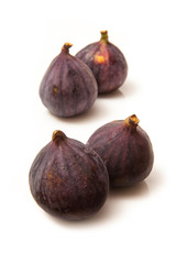 Fresh turkish figs isolated on a white studio background.