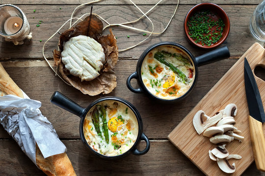 Two pots with veal and cream sauce