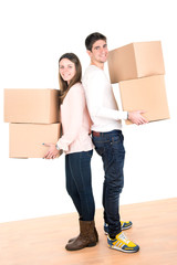 Happy couple with boxes
