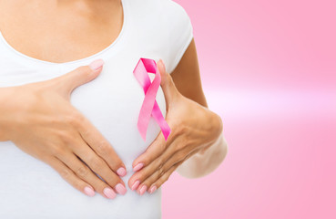 woman with pink cancer awareness ribbon