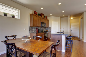 Kitchen room with dining area and walkout deck
