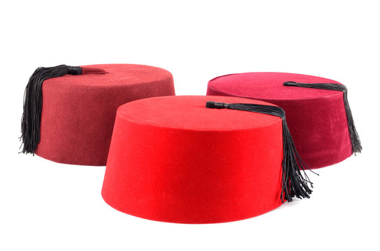 Three red fezzes