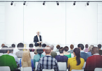 Obraz premium People Listening to the Speaker's Presentation