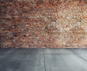 Empty Brick Wall with Concrete Floor