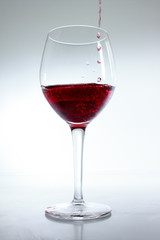 Red wine poured in a glass
