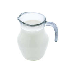 Glass jug of milk isolated on white