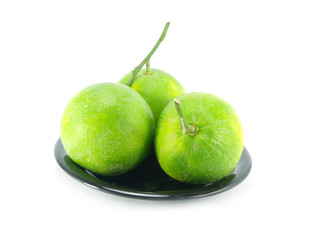 green orange fruit on white background