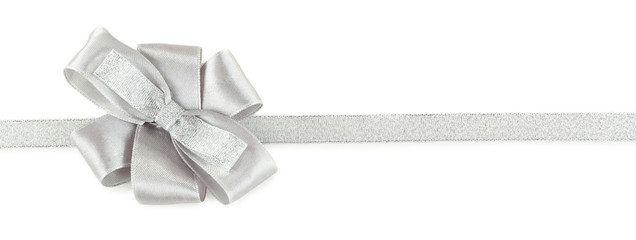 grey and silver ribbon and bow isolated on white