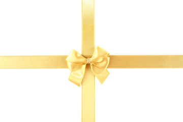 Golden ribbon and bow isolated on white