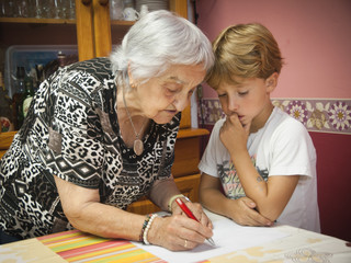 Grandma teaches her great-grandson