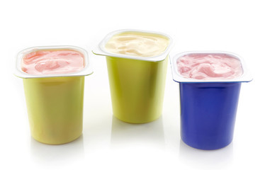 various plastic yogurt pots