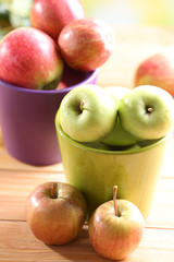 Juicy apples in pots, close-up