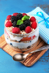Healthy breakfast - yogurt with  fresh fruit, berries and