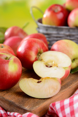 Naklejka na ściany i meble Sweet apples on table on bright background