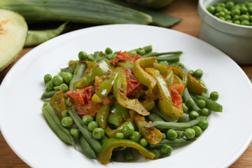 Healthy salad with peas, asparagus and pepper, close-up