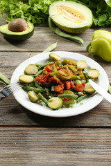 Healthy salad with peas and asparagus served