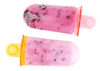 Tasty ice cream pops with fresh berries, isolated on white