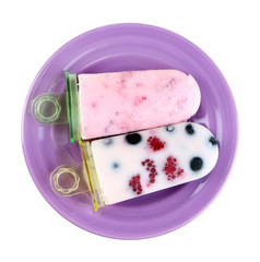 Tasty ice cream pops with fresh berries