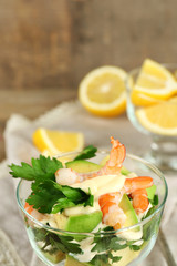 Tasty salad with shrimps and avocado