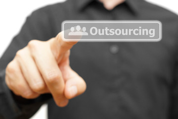Businessman touching Outsourcing word