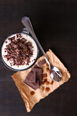 Yogurt, with chocolate cream, chopped chocolate and muesli