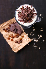 Yogurt, with chocolate cream, chopped chocolate and muesli