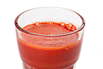 closeup of a glass of tomato juice