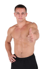 Fototapeta premium Handsome muscle young man isolated on white