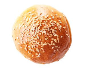 Tasty bun with sesame isolated on white